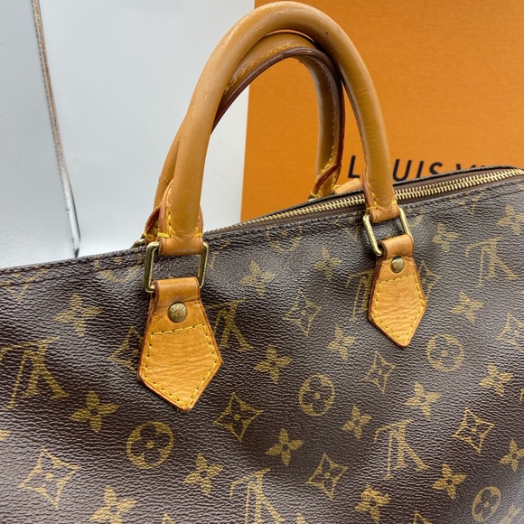 Louis Vuitton Speedy 35 Monogram Handbag. - Picture 5 of 15